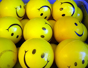 A smiley, or happy face, is a stylized represe...
